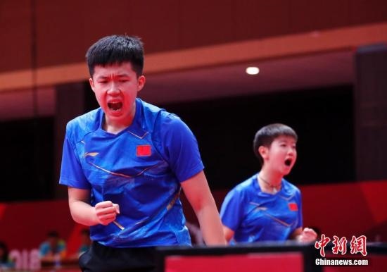 資料圖：雅加達(dá)亞運(yùn)會，王楚欽/孫穎莎奪得混雙冠軍。 <a target='_blank' href='/'>中新社</a>記者 劉關(guān)關(guān) 攝