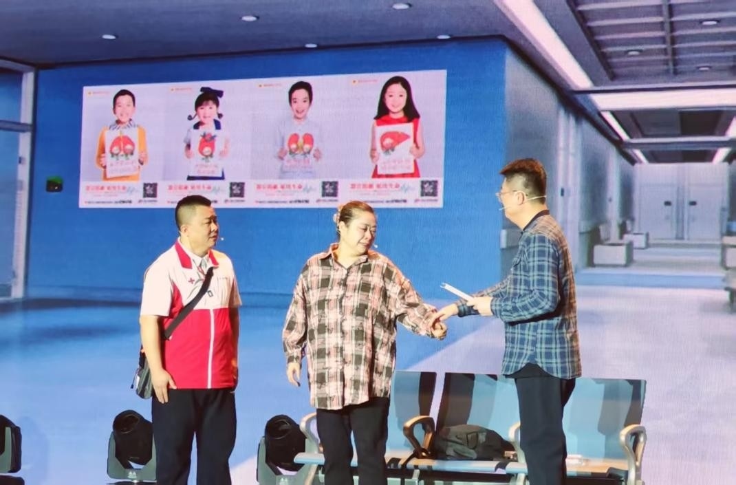 現(xiàn)場表演了由真實(shí)故事改編的情景劇。人民網(wǎng)記者 王子鋒攝